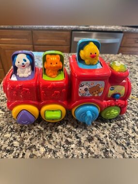 Vtech Colorful Pull-Along Animal Train Toy - Red, Yellow & Blue